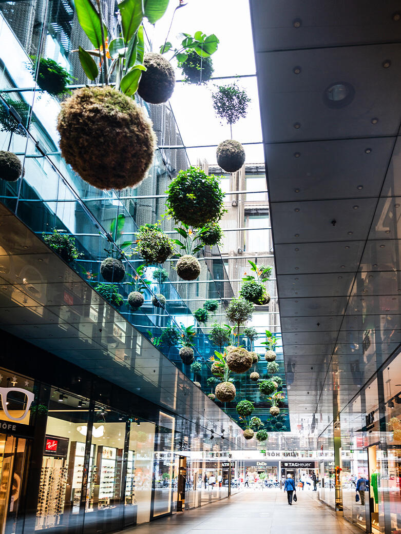Contemporary shopping center interior, representing retail real estate